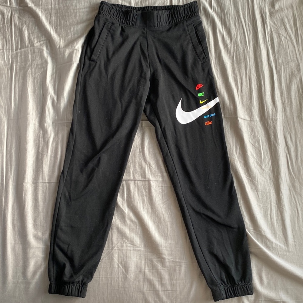 Men’s Nike sweatpants, size small, black with multicolor logo